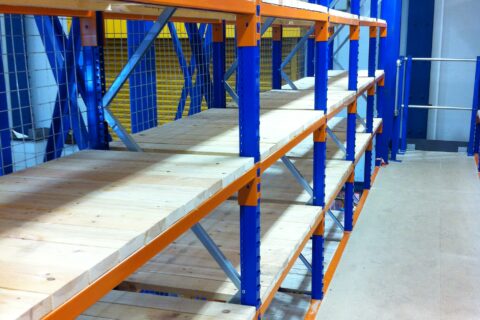 Narrow pallet racking with wooden slats