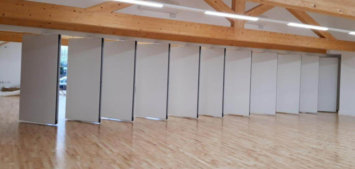 Movable partitioning partially open rotating walls