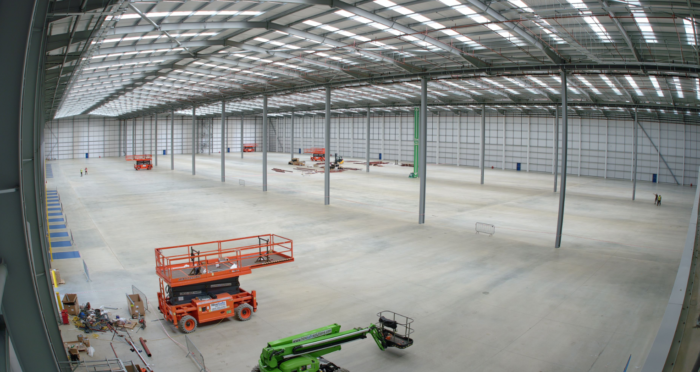 Large warehouse cleared before installation of racking